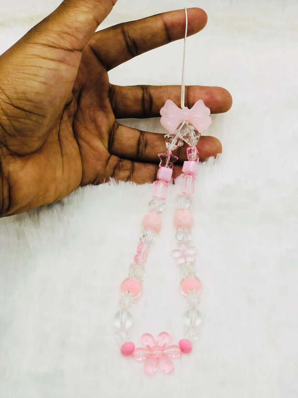 ÀDÙN: Blush phone strap, hand-strung in Blush