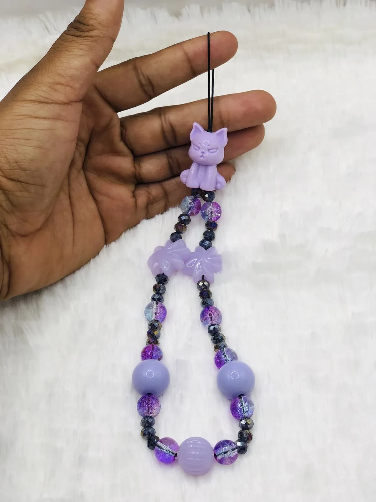 ÀYÒ: Lilac phone strap, hand-strung in Plum