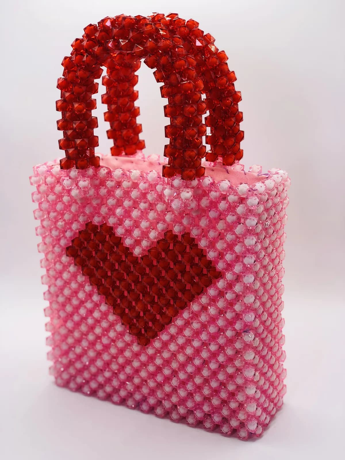 ỌKÀN: Blush tote with a red heart, hand-strung in Blush + Clay