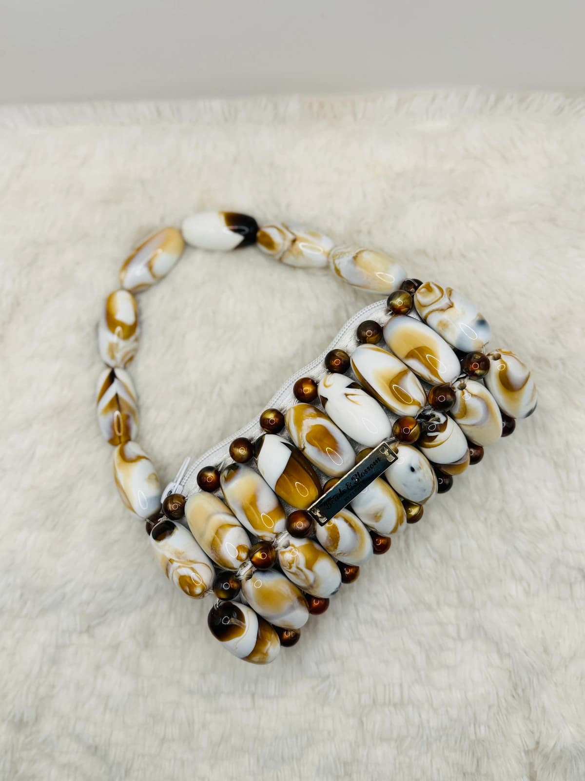 ADÚMÁADÁN: Marbled bead mini clutch in gold or white, hand-strung in Lagos, hand-strung in Marble Gold + Marble White