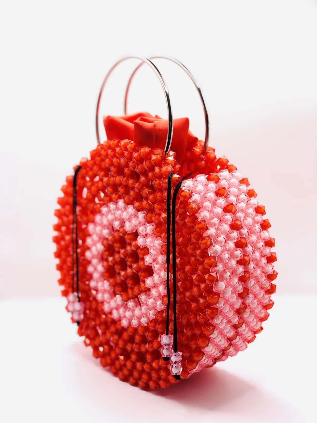 ÌFẸ́: Coral orb with ring handle in Clay + Silver