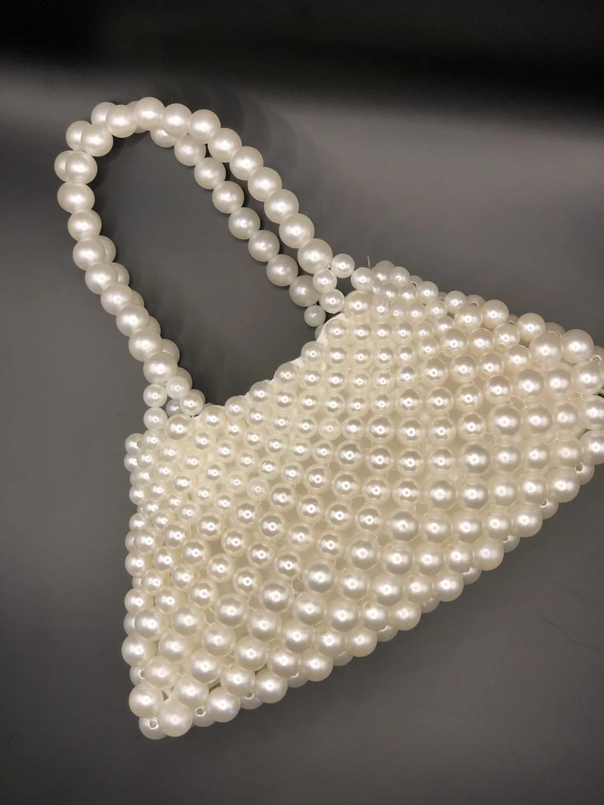 ÒRÍKÌ: Tall ivory pearl tote, hand-strung in Pearl
